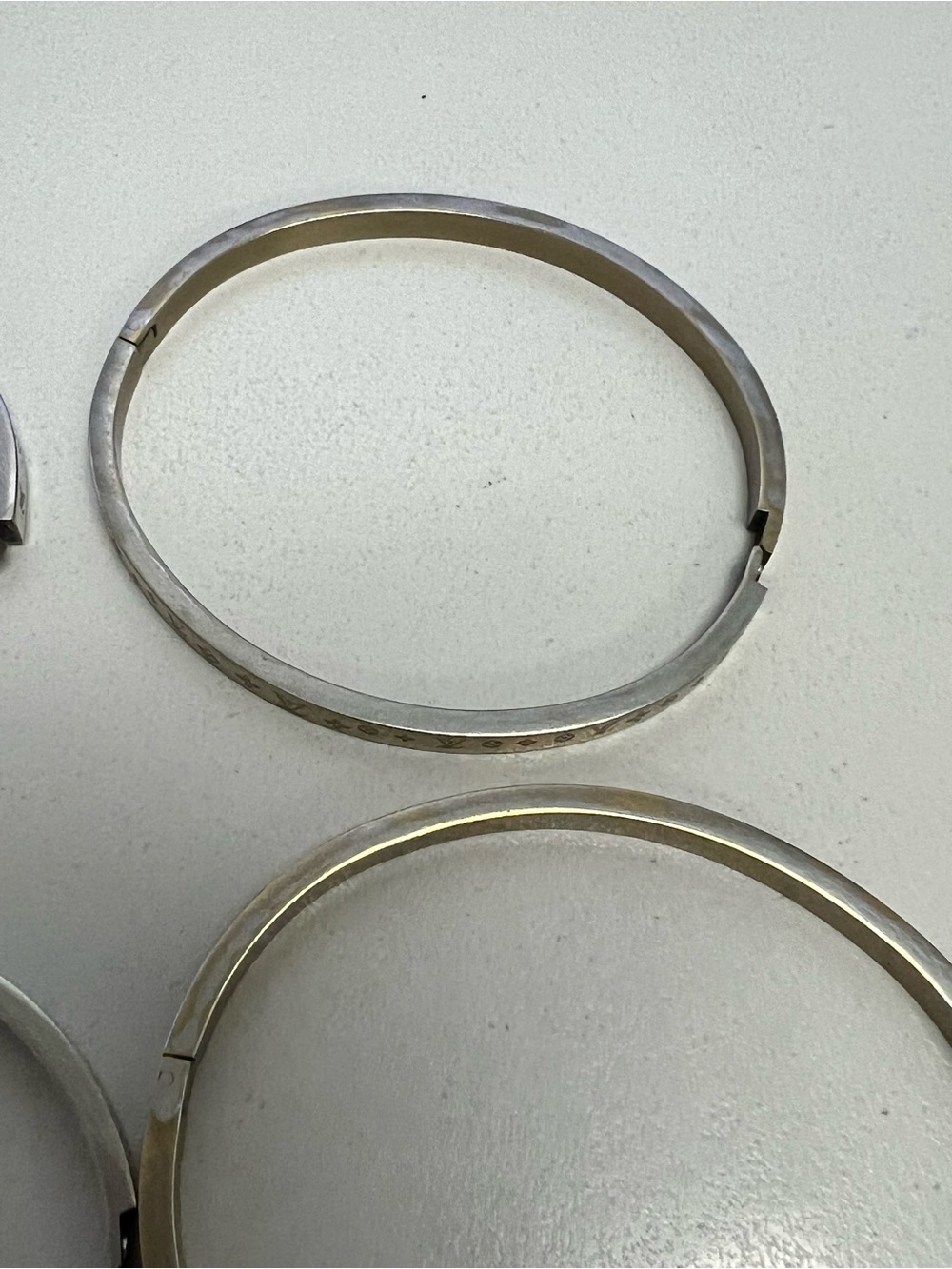Chanel, LV, Gucci Stackable Silver and Gold Logo Bangle Set - Picture 12 of 16